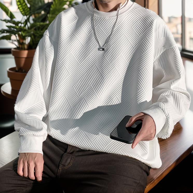 Simple white wall embossed sweater